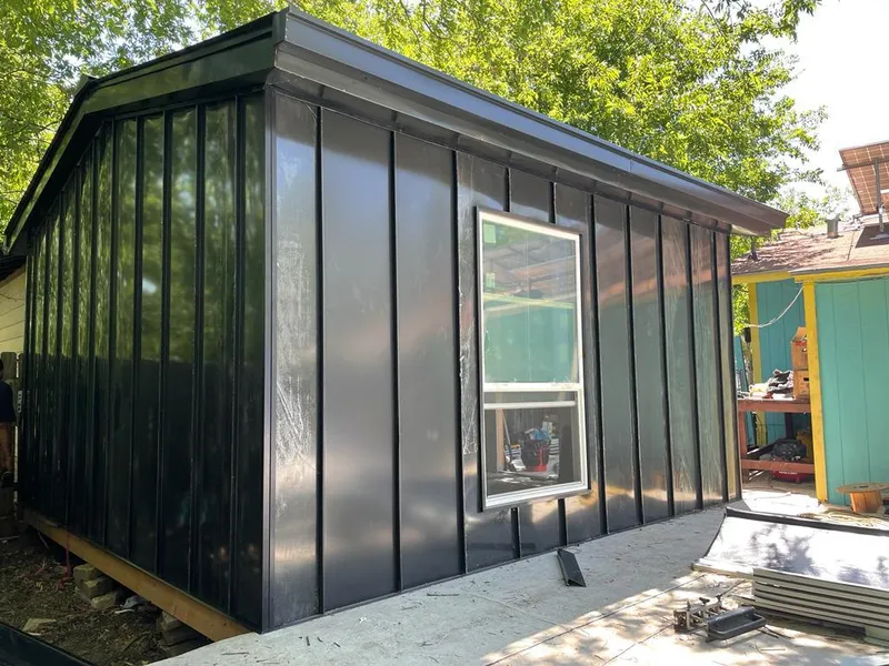 Black standing seam metal wall panels for Roof Inspection in Willington